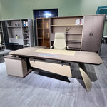 Photo of the Copley desk with blade leg in a showroom office