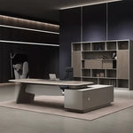 Corely desk in khaki, left return, spotlit shelving behind