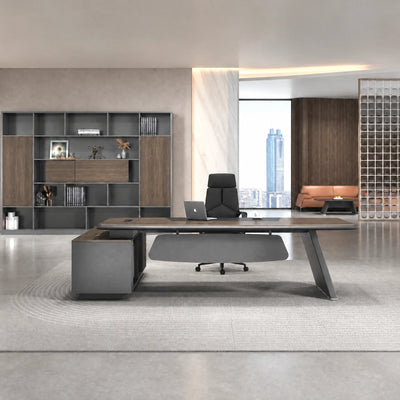 Corely desk in iron gray facing a city window with orange sofa