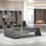 Corely L-shaped desk in a feminine executive office with screen partition