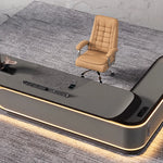 Echelon desk base with LED halo trim and cognac chair, close view