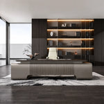 Elevon desk in an architect's dark-paneled studio office