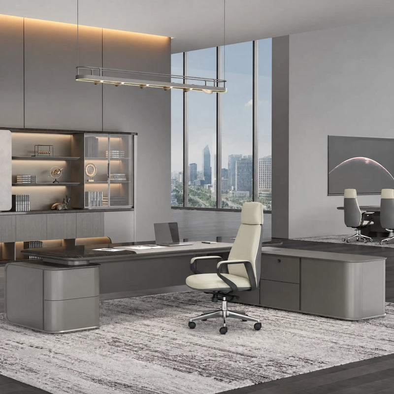 Elevon desk with side table arm in a glass-walled corner office