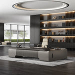 Elevon executive desk beneath an oval skylight and shelf wall