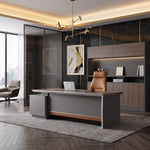 Elgin executive desk in a dark marble executive office beside its matching shelving