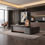 Elgin executive desk in a dark marble executive office beside its matching shelving