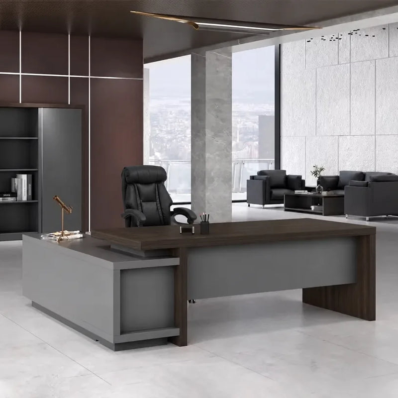 Elmore desk in macassar walnut in a dark marble CEO office