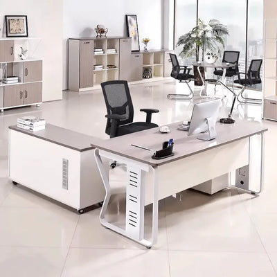 Eszti manager desk with base return in a bright open office