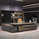 Frisco grand desk in a dark office with backlit shelving