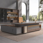 Frisco desk in an arched-window office with glass cabinets