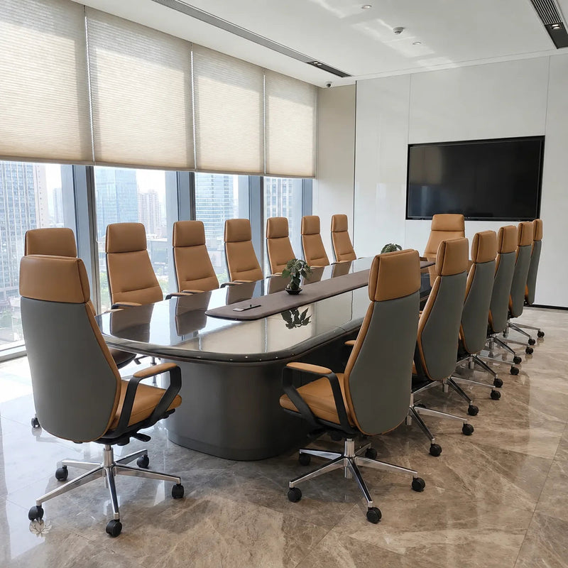 Fusion ebony boardroom table with tan leather chairs in a corner office with city views and a wall TV