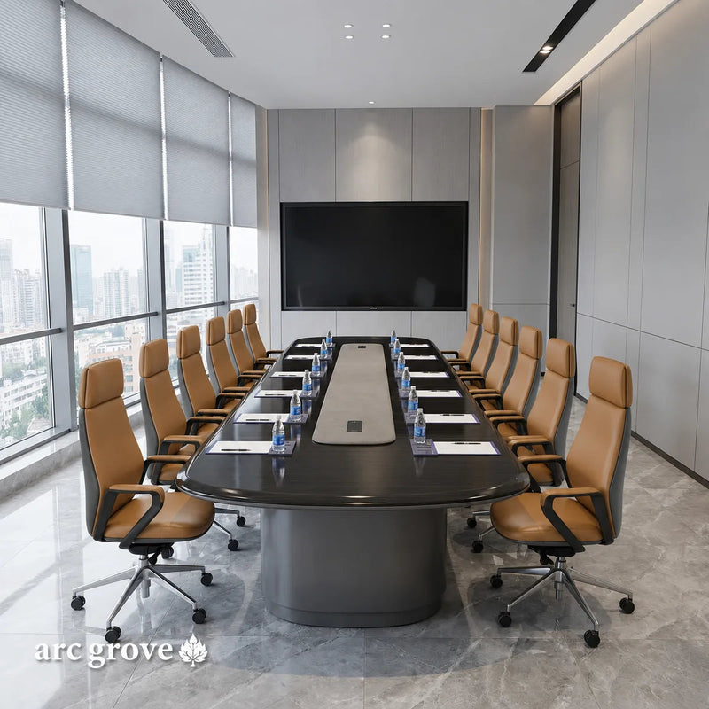 Fusion large conference table in ebony set for a meeting with white chairs, facing a wall display
