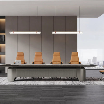 Fusion conference table in a walnut-panelled boardroom with framed black-and-white photos