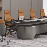 Fusion conference table close up, showing the gray fluted pedestal, ebony top and a laptop