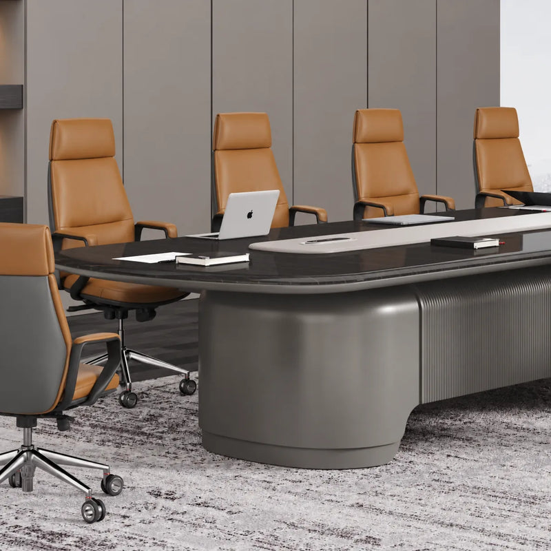 Fusion conference table close up, showing the gray fluted pedestal, ebony top and a laptop