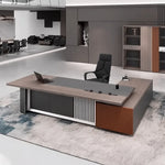 Gidley desk in weathered gray oak, left return, mirror wall behind