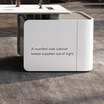 Close-up of the Godel desk's rounded white side cabinet