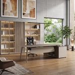 Grafton executive desk in a concrete courtyard office with a garden window beside its matching shelving