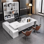 Halcyon desk in a feminine executive office with white bookcase