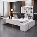 Halcyon desk with monitor in a gold-and-gray corner office