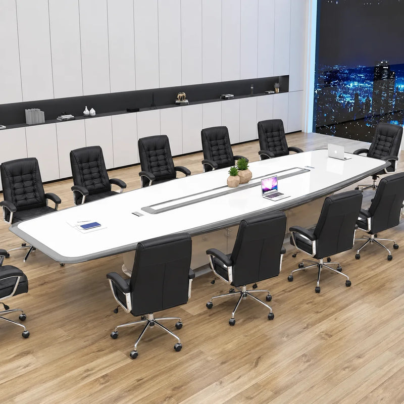 Harmony white high-gloss conference table with a laptop and plant, black leather chairs, three-quarter view