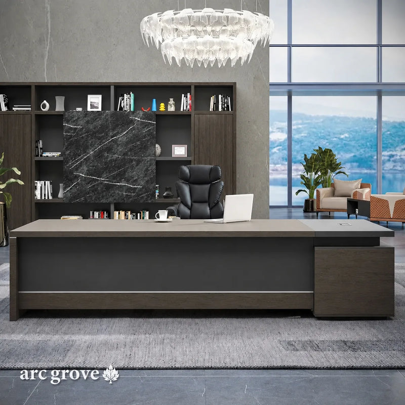 Hershey executive desk in Midnight Black in a spacious modern office with a marble-accent shelf wall