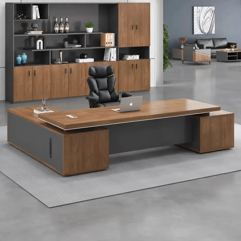 Hewson desk in golden walnut in an office with matching wall system