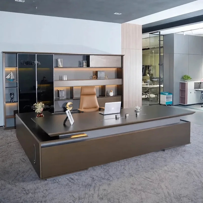Hiley desk in dark bronze in a glass-walled showroom