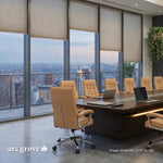 Hunter conference table with tan chairs and laptops beside floor-to-ceiling city windows