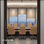 View through glass doors into a boardroom with the Hunter table and tan leather chairs