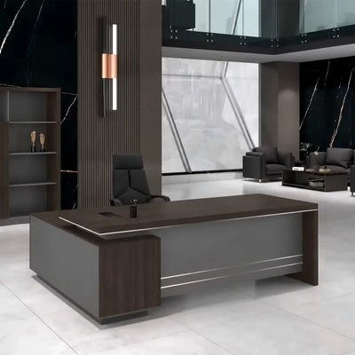 Leeds desk, right return, in a black-marble office with copper sconce