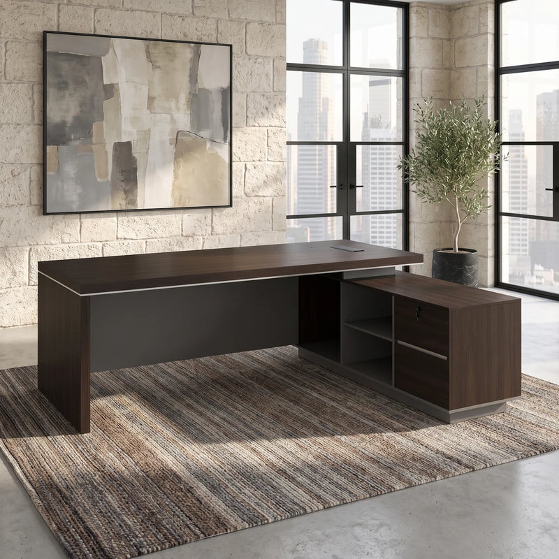 Leeds desk in a sunlit office with a city view