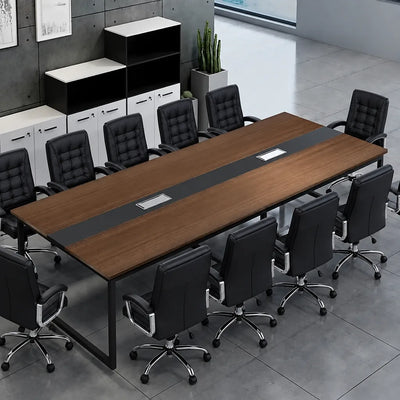Levan amber walnut meeting table with black leather chairs beside white and black storage cabinets