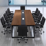 Levan conference table with black chairs facing a window with a harbor view, straight-on view