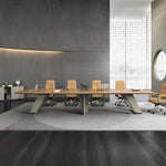 Lyndley executive conference table with tan chairs viewed straight on beneath a floating light panel