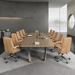 Lyndley boardroom table with ten tan-and-gray chairs on a round rug, angled view