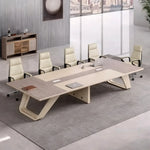 Lyric gray oak meeting table with five tan chairs and a credenza, angled overhead view