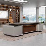 Magill grand desk in a marble office with shelf wall