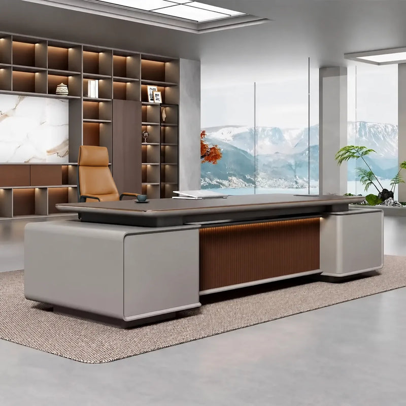 Magill grand desk in a marble office with shelf wall