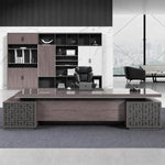 Magnus grand desk with fretwork pedestals and black chair