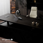Maverick desk with laptop in a moody office corner