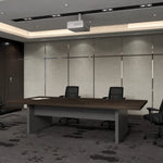 Maxum 8′ or 12′ (96 or 144-inch) meeting table in walnut with two black chairs beneath a projector