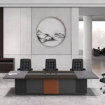 Medley 10′6″ (126-inch) conference table seating 10 beneath a round landscape artwork