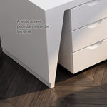 Close-up of the white drawer pedestal under the Newton desk