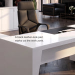 Close-up of the black leather-look pad on the Newton desk