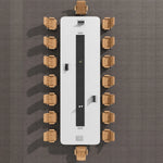 Top-down view of the Nexum conference table seating 14 with two flip-up grommets on the channel