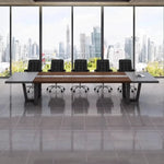 Oakburn dark oak boardroom table with black chairs facing floor-to-ceiling windows and a city skyline