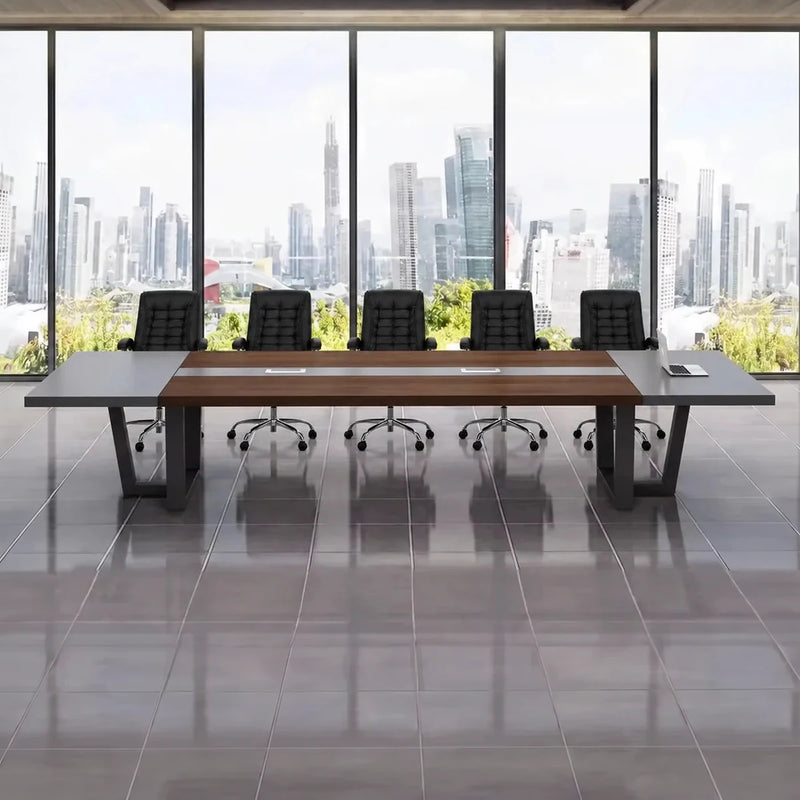 Oakburn dark oak boardroom table with black chairs facing floor-to-ceiling windows and a city skyline