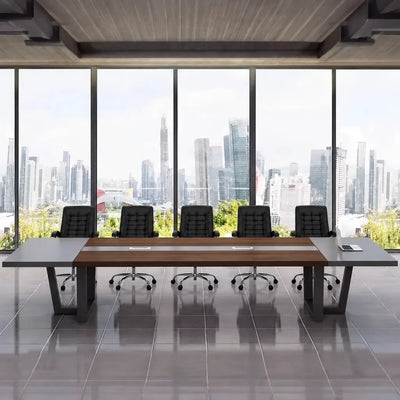 Oakburn dark oak boardroom table with black chairs facing floor-to-ceiling windows and a city skyline
