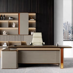Oxley desk, right return, in a dark-panel office with lit shelving